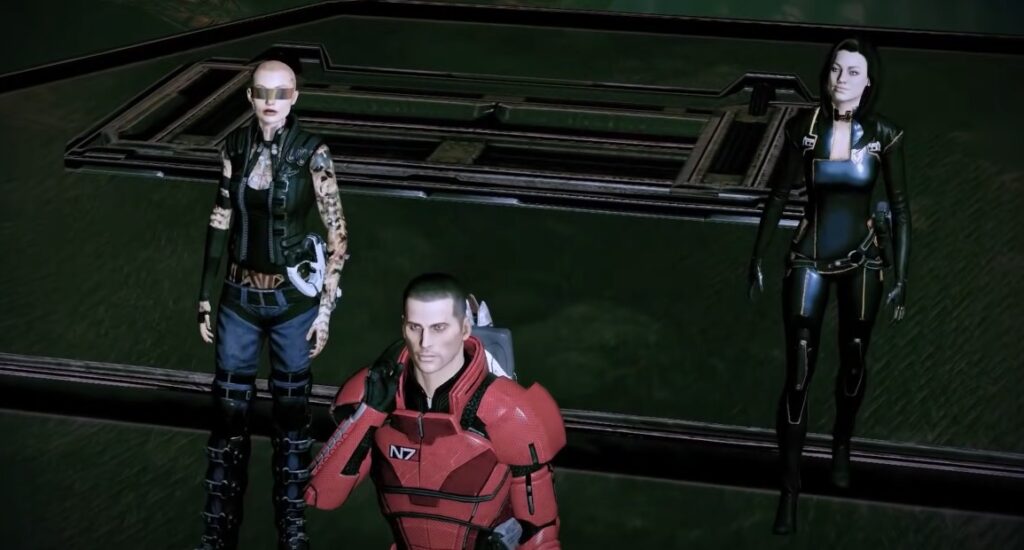 mass effect 2 a scene showing the final act all 3 characters standing together