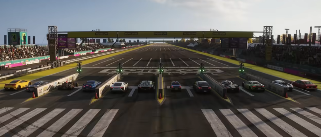 Forza Horizon 6 drag racing scene with multiple performance cars staged side-by-side at the starting line, with timing lights and a long straight track ahead